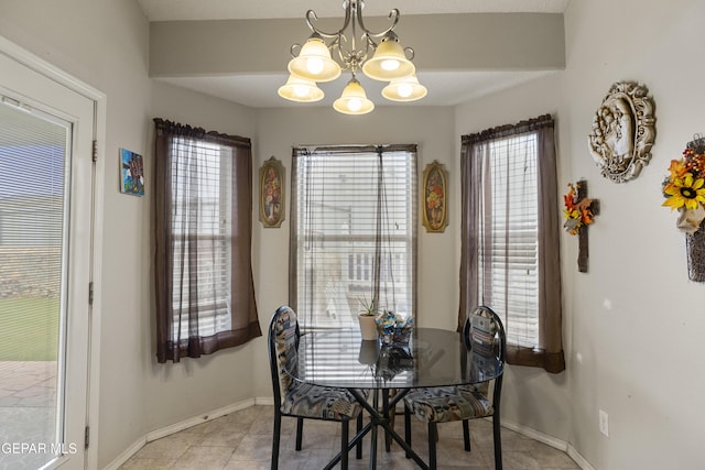 14407 Ocean Point Ln, El Paso, TX 79938 - dining room with a chandelier, baseboards, and light tile patterned flooring