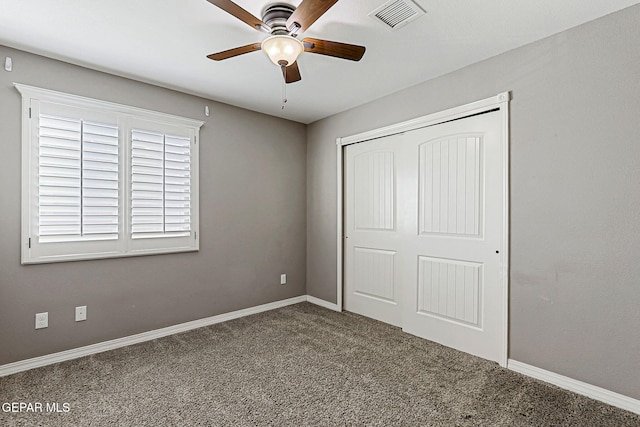 3129 Spring Willow, El Paso, TX 79938 - unfurnished bedroom featuring carpet floors, a closet, baseboards, and a ceiling fan