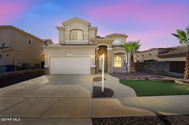 3129 Spring Willow, El Paso, TX 79938 - mediterranean / spanish home with stucco siding, driveway, and a garage