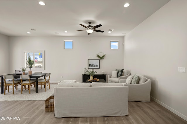 13824 Paseo Bosque Ave, El Paso, TX 79928 - living room with recessed lighting, ceiling fan, wood finished floors, and baseboards