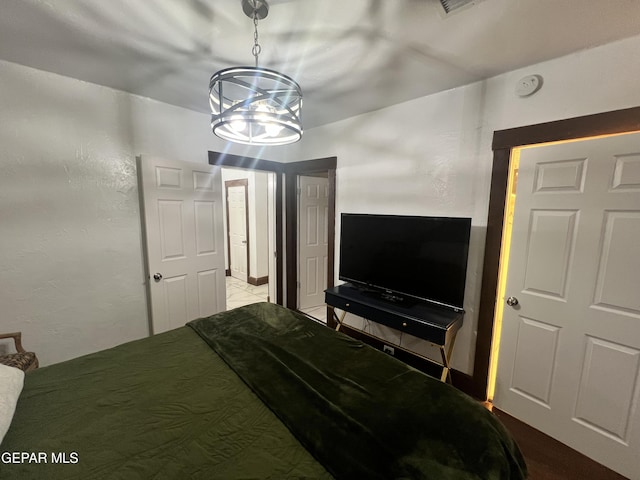 3208 Tularosa Ave, El Paso, TX 79903 - bedroom featuring a chandelier