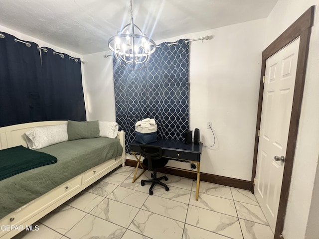 3208 Tularosa Ave, El Paso, TX 79903 - bedroom with light marble finish flooring, a chandelier, and baseboards