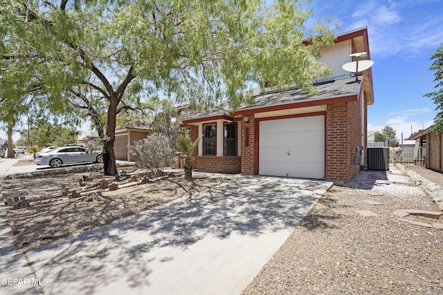 11765 Queens Garden Cir, El Paso, TX 79936 - view of front facade with brick siding and driveway