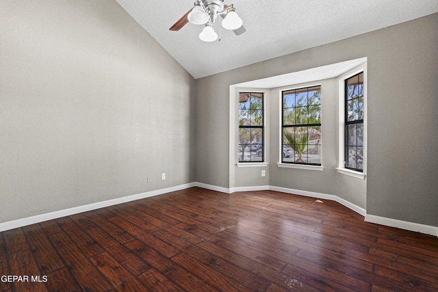 11765 Queens Garden Cir, El Paso, TX 79936 - empty room featuring vaulted ceiling, a ceiling fan, and dark wood-type flooring