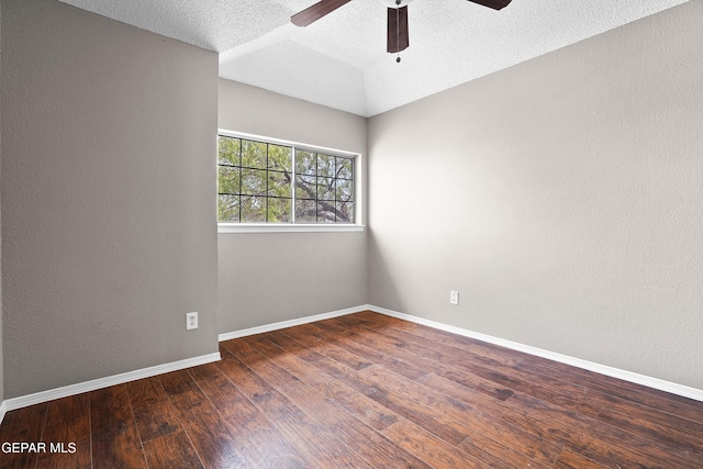 11765 Queens Garden Cir, El Paso, TX 79936 - spare room with ceiling fan, wood finished floors, lofted ceiling, a textured ceiling, and a textured wall