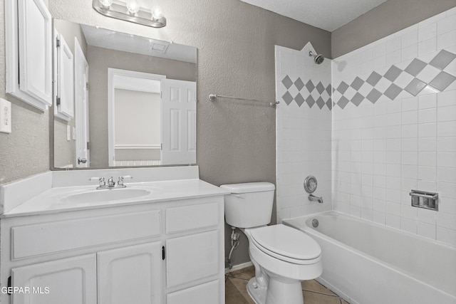 11765 Queens Garden Cir, El Paso, TX 79936 - full bathroom featuring vanity, a textured wall,  shower combination, and tile patterned flooring