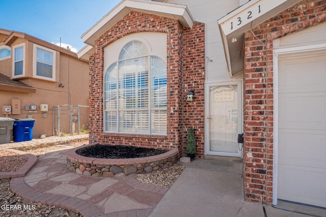 1321 Amber Morgan Dr, El Paso, TX 79936 - view of exterior entry featuring brick siding