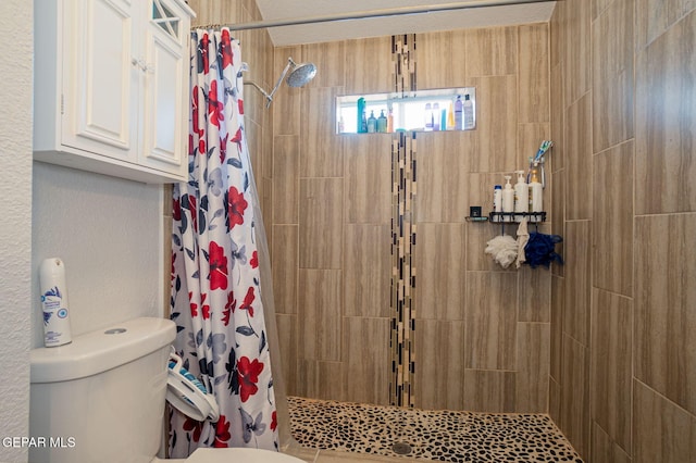 1321 Amber Morgan Dr, El Paso, TX 79936 - full bathroom with toilet and a stall shower