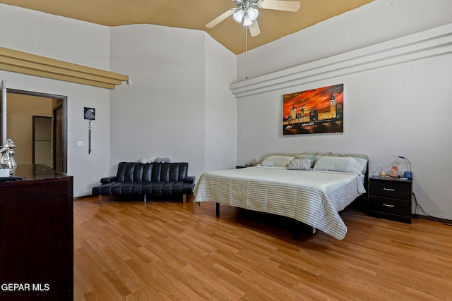 658 John Martin Ct, El Paso, TX 79932 - bedroom featuring light wood-type flooring, high vaulted ceiling, and ceiling fan