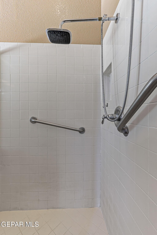 658 John Martin Ct, El Paso, TX 79932 - full bathroom with a tile shower