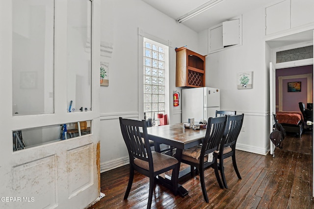 712 N Ochoa St, El Paso, TX 79902 - dining room featuring dark wood-style floors
