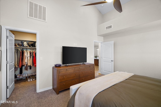 14183 Peyton Edwards Ave, El Paso, TX 79938 - carpeted bedroom featuring a spacious closet, a towering ceiling, and a closet