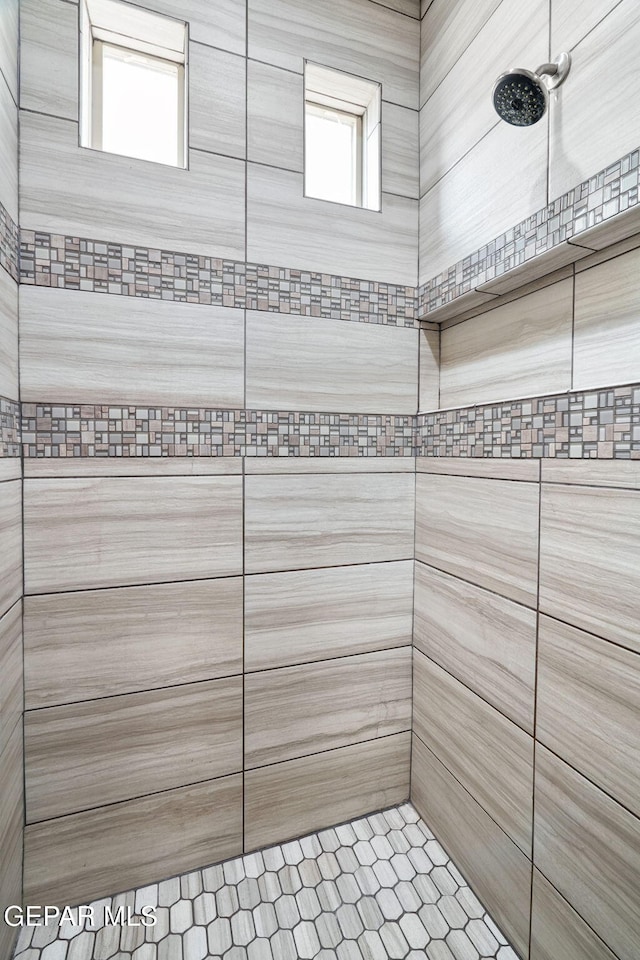 12632 Katherine Brennand Rd, El Paso, TX 79928 - bathroom featuring a tile shower
