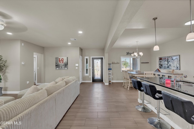 2401 Mike Price Dr, El Paso, TX 79938 - living room featuring recessed lighting, baseboards, a chandelier, and ceiling fan