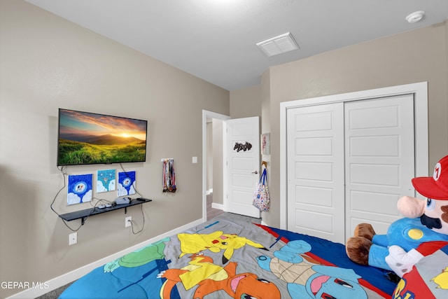 2401 Mike Price Dr, El Paso, TX 79938 - carpeted bedroom with baseboards and a closet