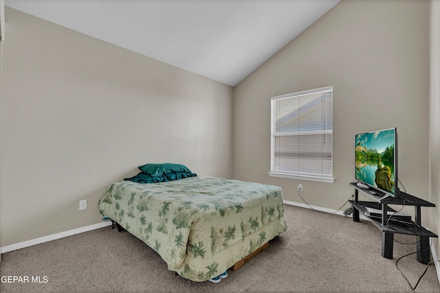 444 Ghost Flower St, Horizon City, TX 79928 - carpeted bedroom featuring baseboards and vaulted ceiling