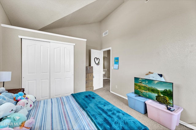 444 Ghost Flower St, Horizon City, TX 79928 - carpeted bedroom featuring a closet and high vaulted ceiling