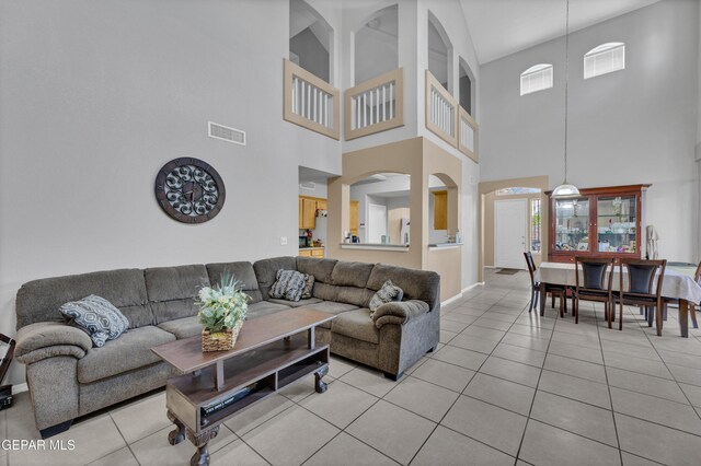 444 Ghost Flower St, Horizon City, TX 79928 - living room featuring a high ceiling and light tile patterned flooring