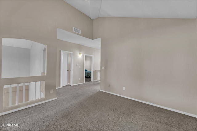 444 Ghost Flower St, Horizon City, TX 79928 - carpeted empty room featuring high vaulted ceiling and arched walkways