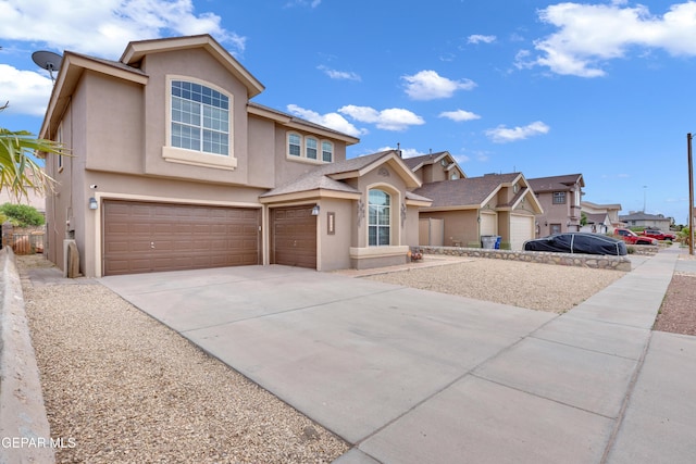 12416 Paseo Largo Cir, El Paso, TX 79928 - traditional home with stucco siding, a garage, concrete driveway, and a residential view