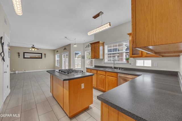 12416 Paseo Largo Cir, El Paso, TX 79928 - kitchen with a sink, stainless steel appliances, dark countertops, a kitchen island, and ceiling fan