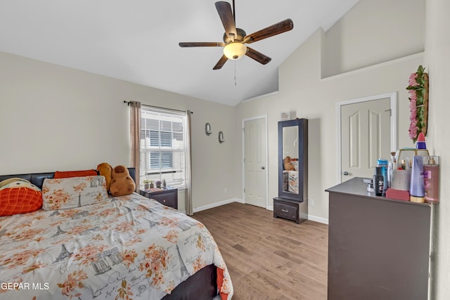 12416 Paseo Largo Cir, El Paso, TX 79928 - bedroom featuring wood finished floors, baseboards, ceiling fan, and high vaulted ceiling