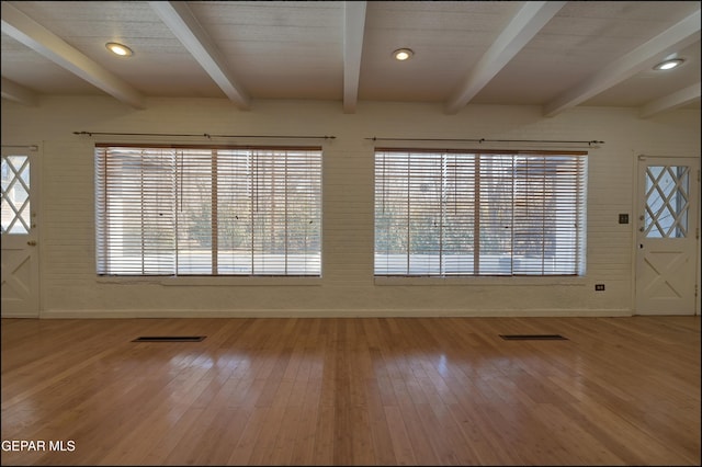 5140 Camino De La Vista Dr, El Paso, TX 79932 - empty room with baseboards, hardwood / wood-style floors, and beam ceiling