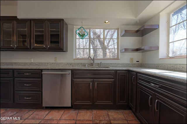 5140 Camino De La Vista Dr, El Paso, TX 79932 - kitchen featuring dishwasher, a sink, open shelves, glass insert cabinets, and dark brown cabinetry
