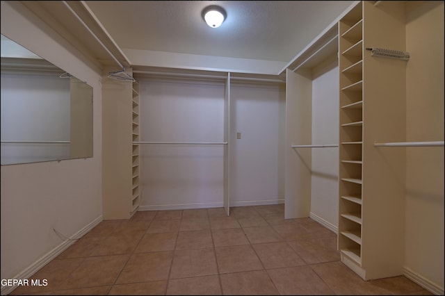 5140 Camino De La Vista Dr, El Paso, TX 79932 - walk in closet featuring tile patterned floors