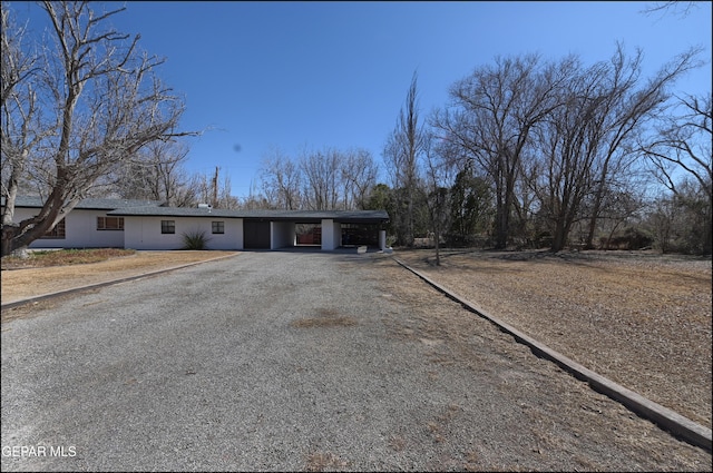 5140 Camino De La Vista Dr, El Paso, TX 79932 - view of front of house featuring driveway and an attached carport