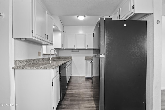 4745 Sierra Madre Dr, El Paso, TX 79904 - kitchen featuring freestanding refrigerator, a sink, dishwasher, white cabinetry, and dark wood-style flooring