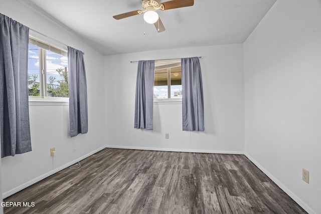 4745 Sierra Madre Dr, El Paso, TX 79904 - unfurnished room featuring wood finished floors, healthy amount of natural light, baseboards, and a ceiling fan