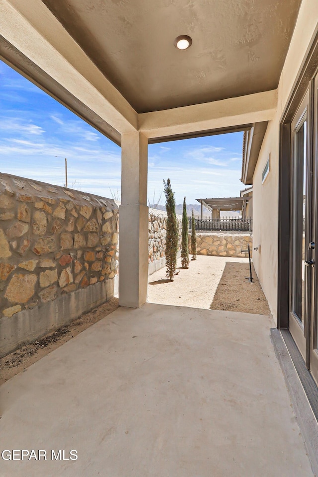 2352 Kolt Ct, El Paso, TX 79911 - fenced backyard with a patio area