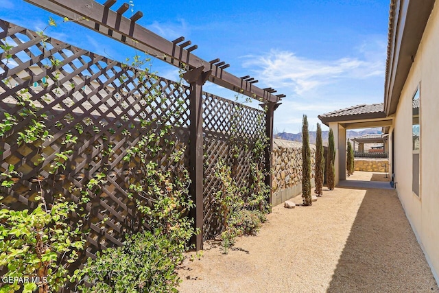 2352 Kolt Ct, El Paso, TX 79911 - view of yard featuring a pergola