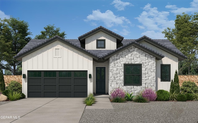 1449 Indigo Sky St, El Paso, TX 79928 - view of front of house with stone siding, board and batten siding, an attached garage, and driveway
