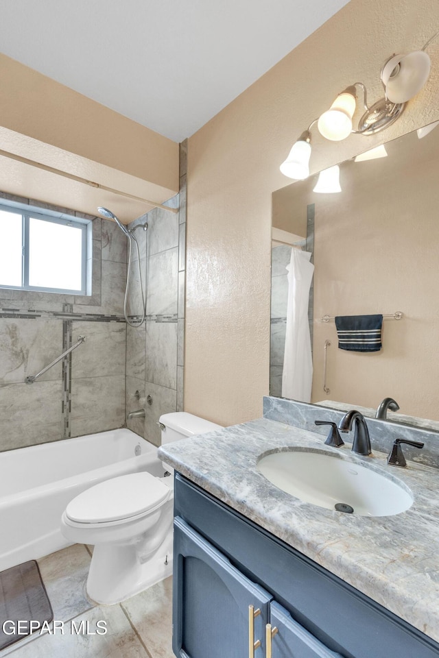 6800 Canyon Run Dr, El Paso, TX 79912 - bathroom with vanity, shower / tub combo, toilet, and tile patterned floors