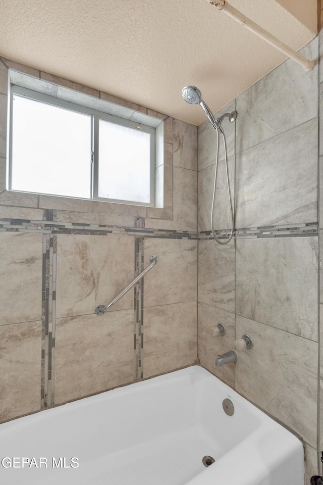 6800 Canyon Run Dr, El Paso, TX 79912 - bathroom featuring shower / washtub combination and a textured ceiling