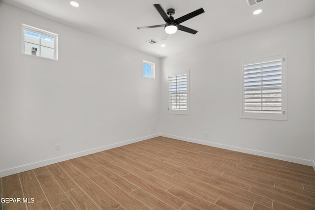 13376 Coldham St, El Paso, TX 79928 - spare room featuring a ceiling fan, light wood-type flooring, baseboards, and recessed lighting
