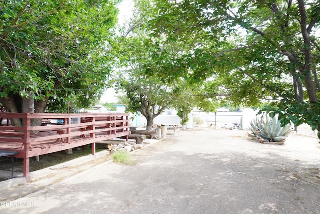 11110 Westside Rd, Anthony, NM 88021 - view of yard with a wooden deck and a patio