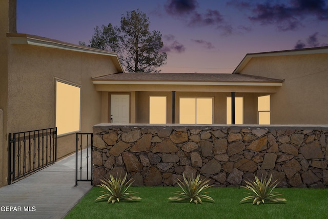 628 Milo Dr, El Paso, TX 79927 - doorway to property with stucco siding