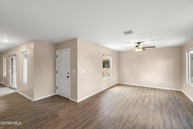 628 Milo Dr, El Paso, TX 79927 - spare room with baseboards, ceiling fan, and wood finished floors
