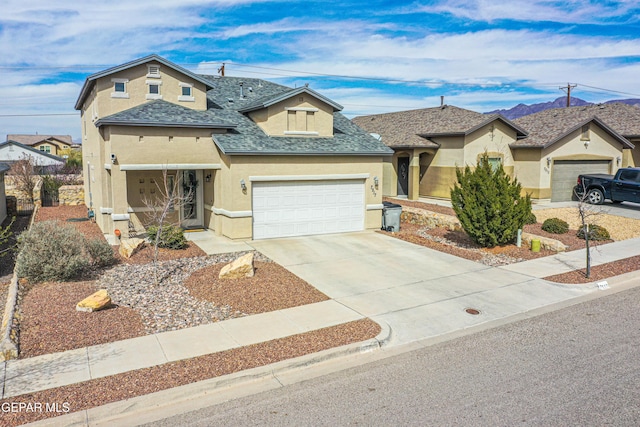 7517 Red Cedar Dr, El Paso, TX 79911 - view of front of home with stucco siding, concrete driveway, a garage, and a shingled roof