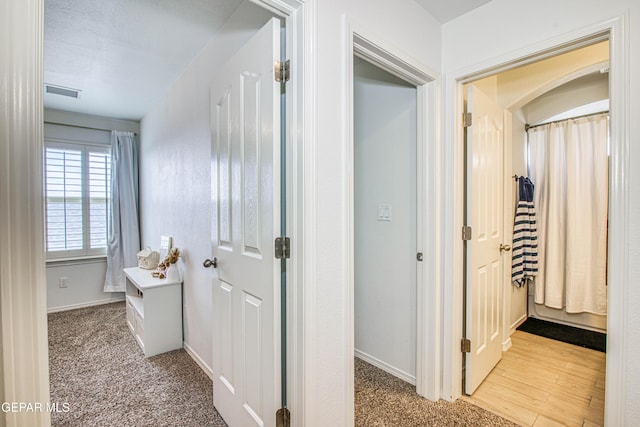 7517 Red Cedar Dr, El Paso, TX 79911 - hallway featuring baseboards and carpet