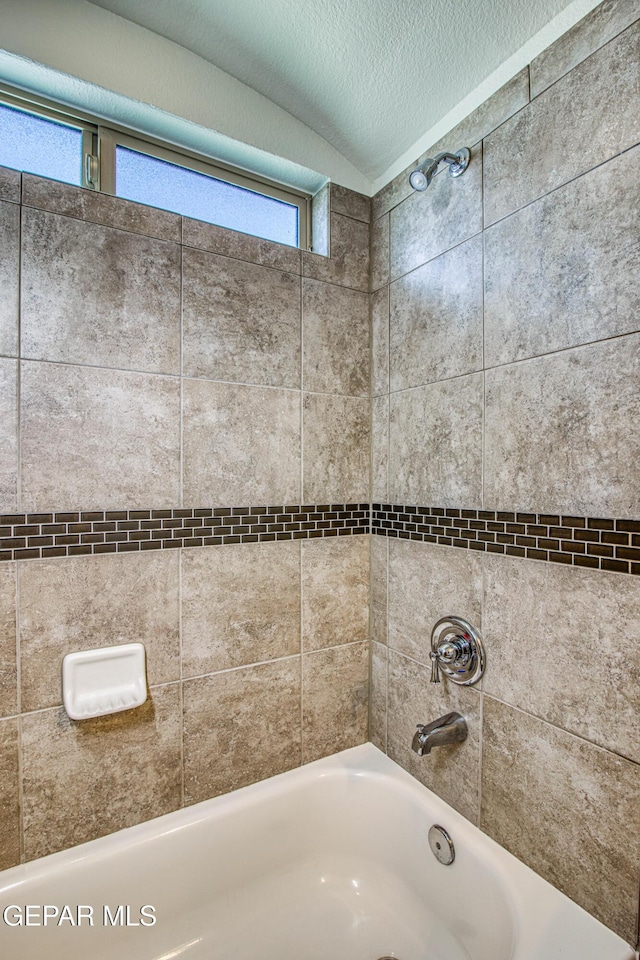 7517 Red Cedar Dr, El Paso, TX 79911 - bathroom featuring shower / bathtub combination and a textured ceiling