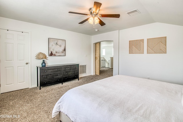 7517 Red Cedar Dr, El Paso, TX 79911 - carpeted bedroom with arched walkways, lofted ceiling, and ceiling fan