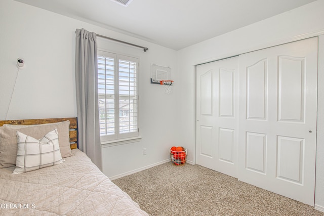 7517 Red Cedar Dr, El Paso, TX 79911 - carpeted bedroom with a closet and baseboards