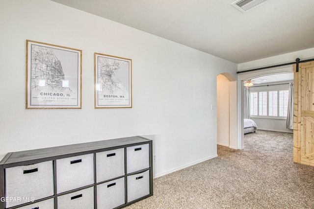 7517 Red Cedar Dr, El Paso, TX 79911 - hall featuring light carpet, arched walkways, and baseboards