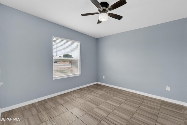 3899 Vanderveer Dr Unit A B C, El Paso, TX 79938 - tiled empty room featuring baseboards and a ceiling fan