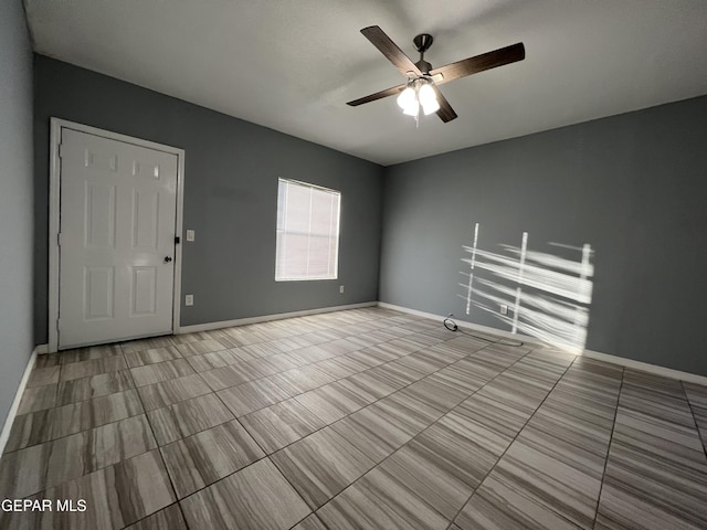 3899 Vanderveer Dr Unit A B C, El Paso, TX 79938 - tiled spare room with a ceiling fan and baseboards