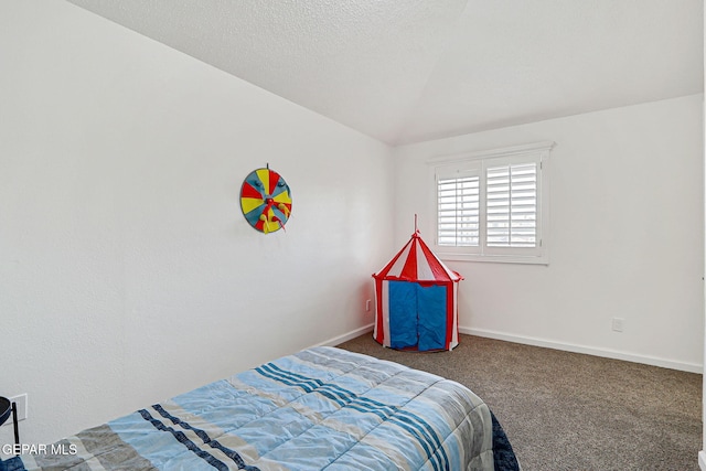 6929 Canyon View Ln, El Paso, TX 79912 - bedroom featuring carpet, baseboards, and vaulted ceiling